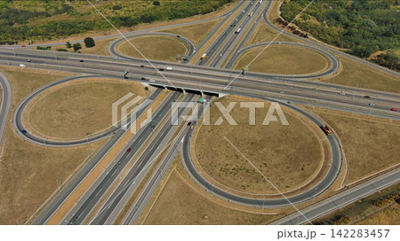 Road interchange or highway intersection. Junction transportation Road interchange or highway intersection. Junction transportation 142283457