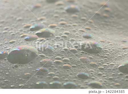 Many bubbles foam from soap bath shampoo shower gel on surface. Fluffy bath foam or beer bubble froth on surface wave curve texture form bubble Many bubbles foam from soap bath shampoo shower gel on surface. Fluffy bath foam or beer bubble froth on surface wave curve texture form bubble 142284385