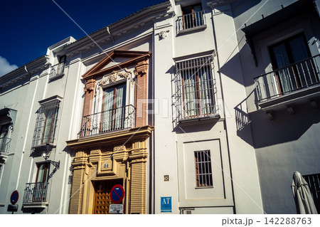 Santa Cruz: Seville's Vibrant Economic Heart 142288763
