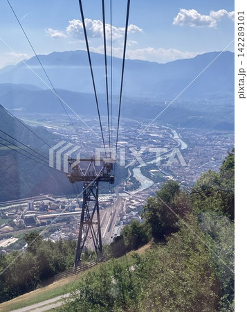 High angle breathtaking panoramic view of a mountain valley from a cable car High angle breathtaking panoramic view of a mountain valley from a cable car 142289101
