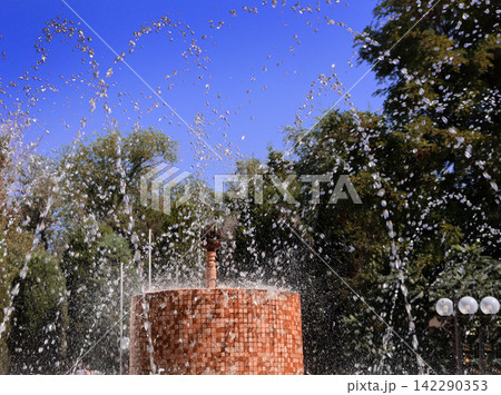 fountain in city park in rainy season fountain in city park in rainy season 142290353