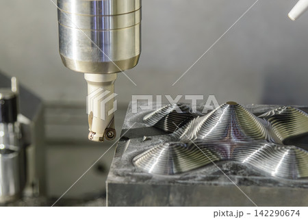 Rough cutting process on steel mold parts using indexable tool on CNC milling machine 142290674