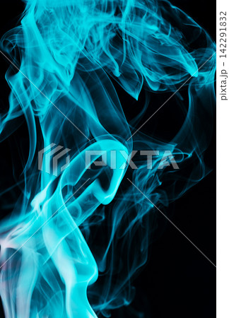 Abstract blue smoke swirls isolated on black background 142291832