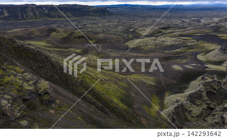 Aerial view of volcanic lava fields with moss coverage and crater formations, Skaft?rhreppur Iceland Aerial view of volcanic lava fields with moss coverage and crater formations, Skaft?rhreppur Iceland 142293642