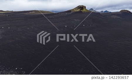 Lava field with cinder cones and moss-covered peaks, Skaft?rhreppur Iceland Lava field with cinder cones and moss-covered peaks, Skaft?rhreppur Iceland 142293657