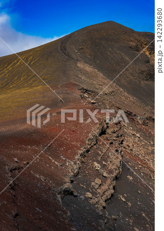 Volcanic cinder cone with colorful mineral deposits in Iceland Volcanic cinder cone with colorful mineral deposits in Iceland 142293680