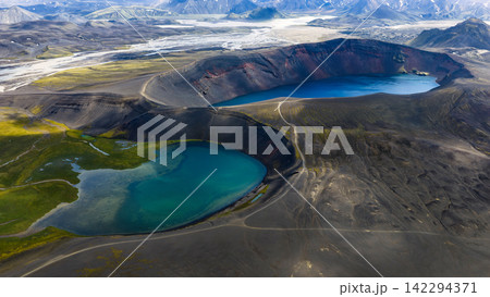 Aerial view of crater lakes with turquoise and teal water, ytra Iceland 142294371