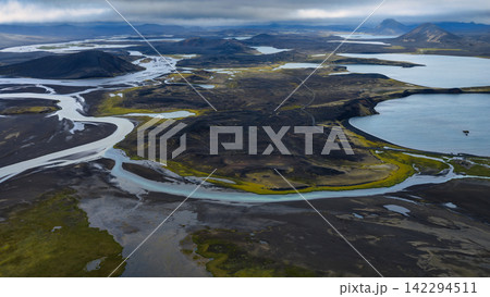Aerial view of glacial river delta and volcanic terrain, ytra Iceland 142294511