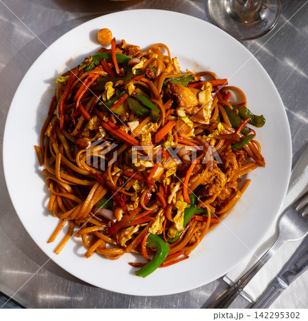 Japanese stir fried noodles with vegetables and egg Japanese stir fried noodles with vegetables and egg 142295302