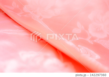 Background pink silk clouth wave abstract texture soft tablecloth cotton textile backdrop cosmetic beauty template presentation, silky velvet linen mockup cloth dress curtain backdrop clothing. Background pink silk clouth wave abstract texture soft tablecloth cotton textile backdrop cosmetic beauty template presentation, silky velvet linen mockup cloth dress curtain backdrop clothing. 142297360