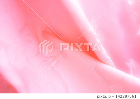 Background pink silk clouth wave abstract texture soft tablecloth cotton textile backdrop cosmetic beauty template presentation, silky velvet linen mockup cloth dress curtain backdrop clothing. Background pink silk clouth wave abstract texture soft tablecloth cotton textile backdrop cosmetic beauty template presentation, silky velvet linen mockup cloth dress curtain backdrop clothing. 142297361