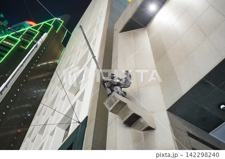Hong Kong June 26 2026 Art Deco gargoyle flagpole on BEA Building facade 142298240