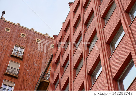 Red brick residential building facade in Budapest 142298748