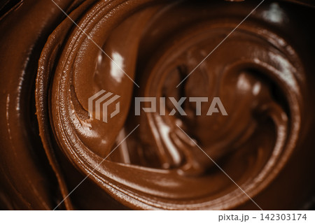 Glossy Chocolate Cream Swirl Macro Glossy Chocolate Cream Swirl Macro 142303174