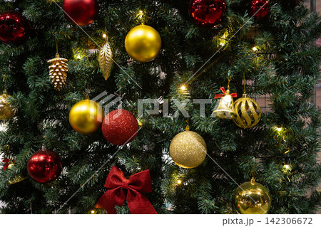 Christmas Tree Decorated with Colorful Ornaments and Lights. Christmas Tree Decorated with Colorful Ornaments and Lights. 142306672