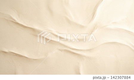 Light beige textured plaster surface showing smooth sweeping wavy ridges providing blank empty canvas ready for custom graphic design background layout integration 142307884