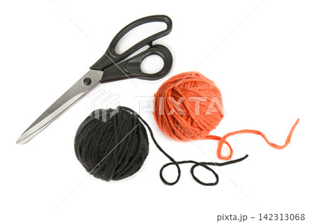 Black and Orange Yarn Balls with Scissors Isolated on White Background Craft and Knitting Supplies with Yarn Clews and Black Scissors Black and Orange Yarn Balls with Scissors Isolated on White Background Craft and Knitting Supplies with Yarn Clews and Black Scissors 142313068