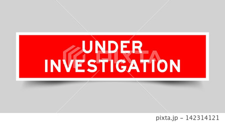 Red color square shape sticker label with word under investigation on gray background Red color square shape sticker label with word under investigation on gray background 142314121