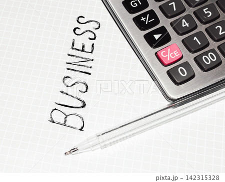 Business concept illustrated with pen, calculator Business concept illustrated with pen, calculator 142315328