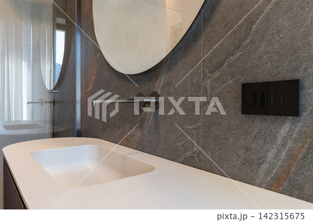 Empty bathroom vanity counter with integrated basin showing clear geometry Empty bathroom vanity counter with integrated basin showing clear geometry 142315675