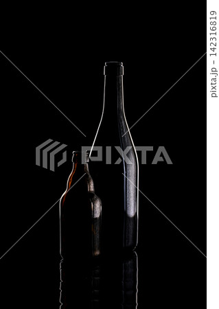 Still life with glass objects on a black background 142316819
