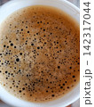 Freshly brewed coffee showing rich crema texture 142317044