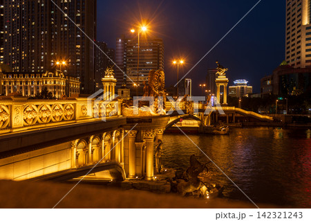 close up view of illuminated Daguangming Bridge over Haihe River at night in Tianjin 142321243