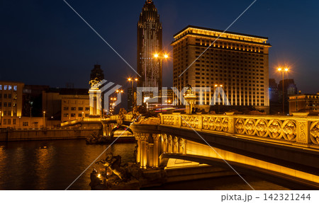 close up view of illuminated Daguangming Bridge over Haihe River at night in Tianjin 142321244