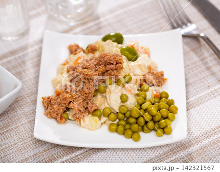 Spanish salad called Ensalada rusa Spanish salad called Ensalada rusa 142321567