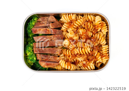 fusilli and spaghetti pasta bento boxes with steak sausages and fresh fruit 142322519