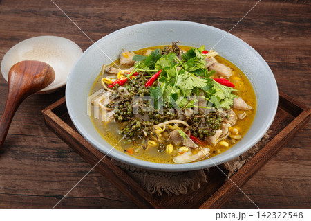 sichuan boiled fish fillet with rattan pepper green peppercorn and bean sprouts 142322548