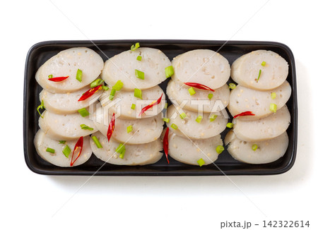 cooked flying fish roe chicken sausages on wooden cutting board 142322614