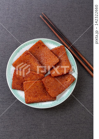chinese traditional Huangba steamed glutinous rice cake wrapped in bamboo leaves chinese traditional Huangba steamed glutinous rice cake wrapped in bamboo leaves 142322660