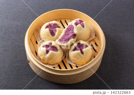 steamed purple sweet potato blooming buns with split top showing filling steamed purple sweet potato blooming buns with split top showing filling 142322663