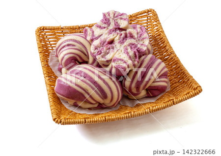 layered purple sweet potato swirl steamed buns huajuan in woven basket 142322666