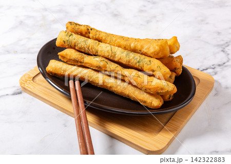 traditional Fried Dough Sticks Seasoned with Fennel Seeds 142322883