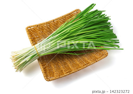 bundle of Green Garlic Chives Isolated on White Background bundle of Green Garlic Chives Isolated on White Background 142323272