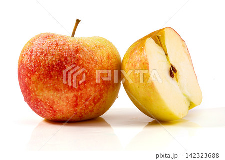 whole and Half Cut Red Gala Apple 142323688