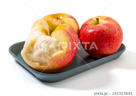 whole and Half Cut Red Gala Apple 142323691