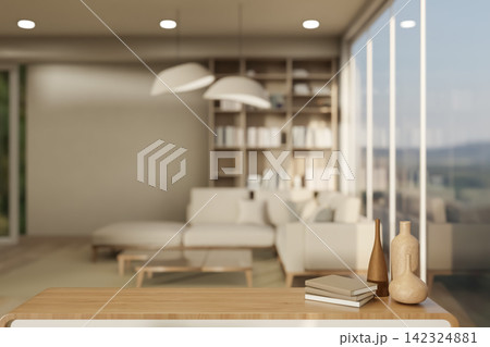 Wooden Table Top Mockup with Ceramic Vases and Books on Blurred Living Room Background 142324881