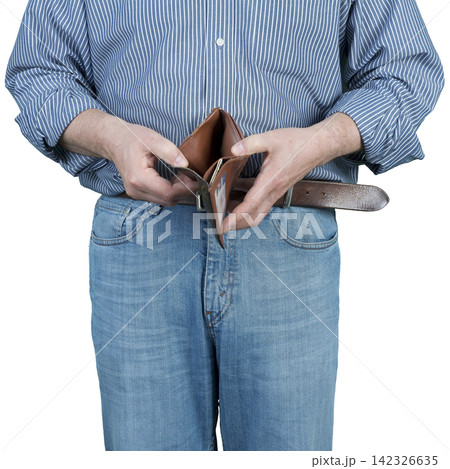 A person in jeans and a blue striped shirt is holding an open, empty brown wallet. 142326635
