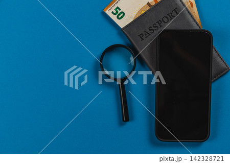 Travel essentials with smartphone, passport, and euro cash 142328721