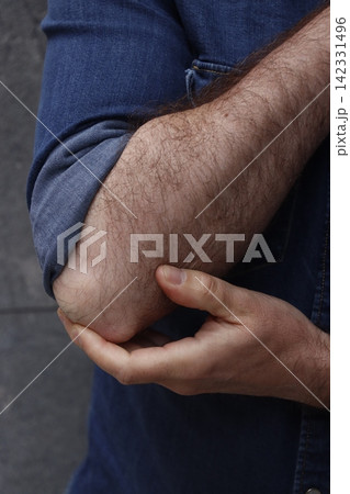 Pain in arm after work Pain in arm after work 142331496