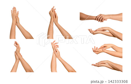 Female hand gently massages another woman's palm. Gesture suggests tenderness, moisturizing, or a Female hand gently massages another woman's palm. Gesture suggests tenderness, moisturizing, or a 142333308