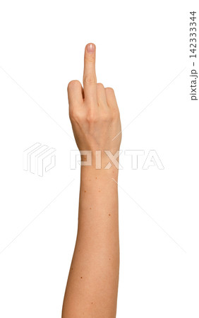 Female hand thrusts middle finger straight at camera. Gesture reads as defiant and confrontational Female hand thrusts middle finger straight at camera. Gesture reads as defiant and confrontational 142333344