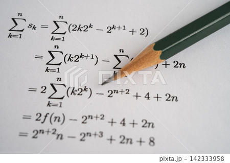 Pencil on mathematic formula exercise test paper in education school. Pencil on mathematic formula exercise test paper in education school. 142333958