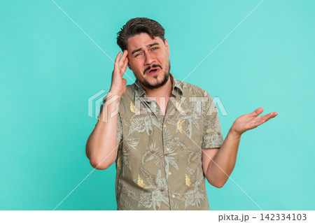 Adult man reacts with disappointment after failure bad result frustration Adult man reacts with disappointment after failure bad result frustration 142334103