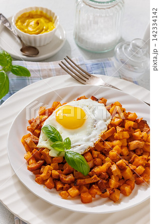 Diced fried potatoes cooked with cubed sausage Diced fried potatoes cooked with cubed sausage 142334142