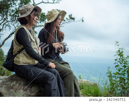 tourist with backpack hiking in forest 142340751
