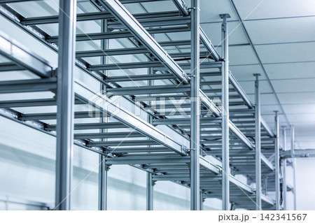 Modern industrial shelving system with aluminum construction and clean lines Modern industrial shelving system with aluminum construction and clean lines 142341567